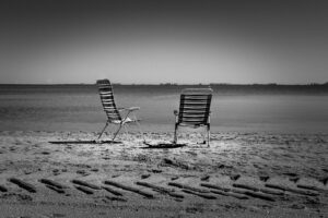 Empty Seats by the Water